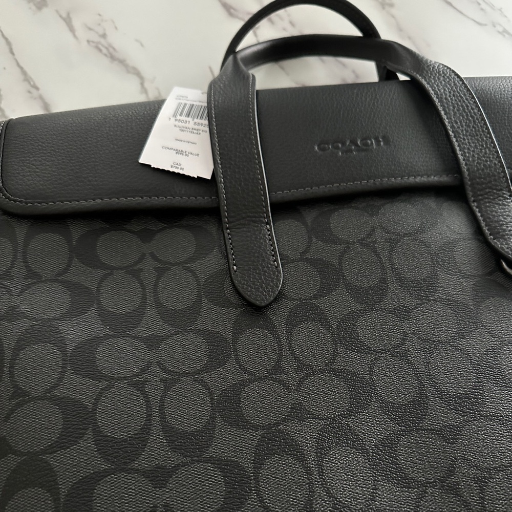 Unisex Coach briefcase/laptop bag. Fits up to a 16” MacBook Pro.